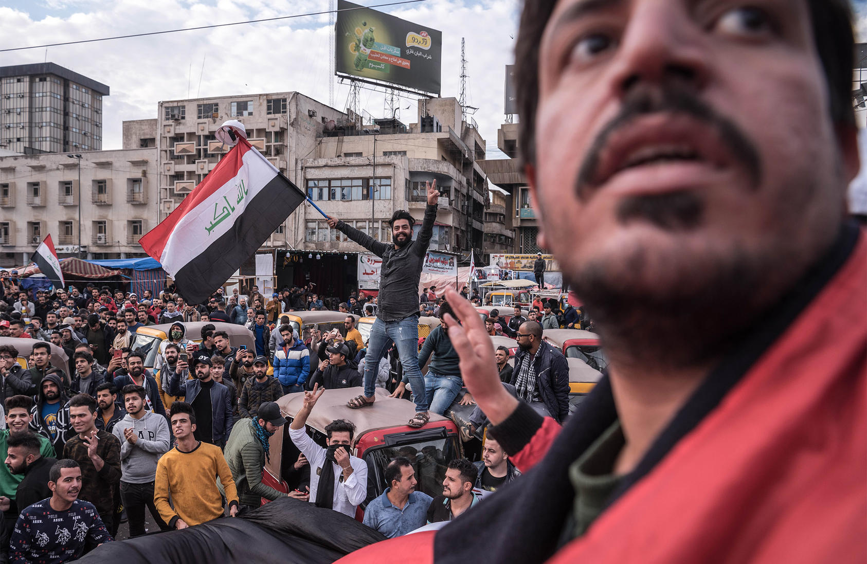 Iraqi demonstrators shout slogans during anti-government protests in Baghdad on Friday, Jan. 10, 2020. (Sergey Ponomarev/The New York Times)