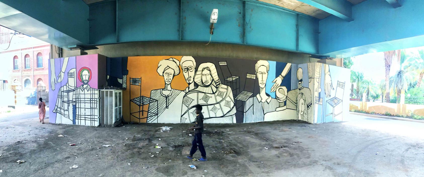 Galal calls this mural, under Mak Nimr bridge in Khartoum, "for the people and by the people" because it was created with the support of a team of volunteers. This mural marks the signing of the agreement for a 39-month transitional period. (Galal Yousif)