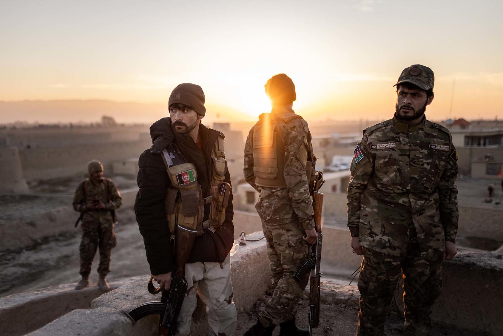 Policemen stationed at a guard post on Mazar-i-Sharif’s defensive walls in Balkh Province, Afghanistan, on Jan. 17, 2021. (Jim Huylebroek/The New York Times)