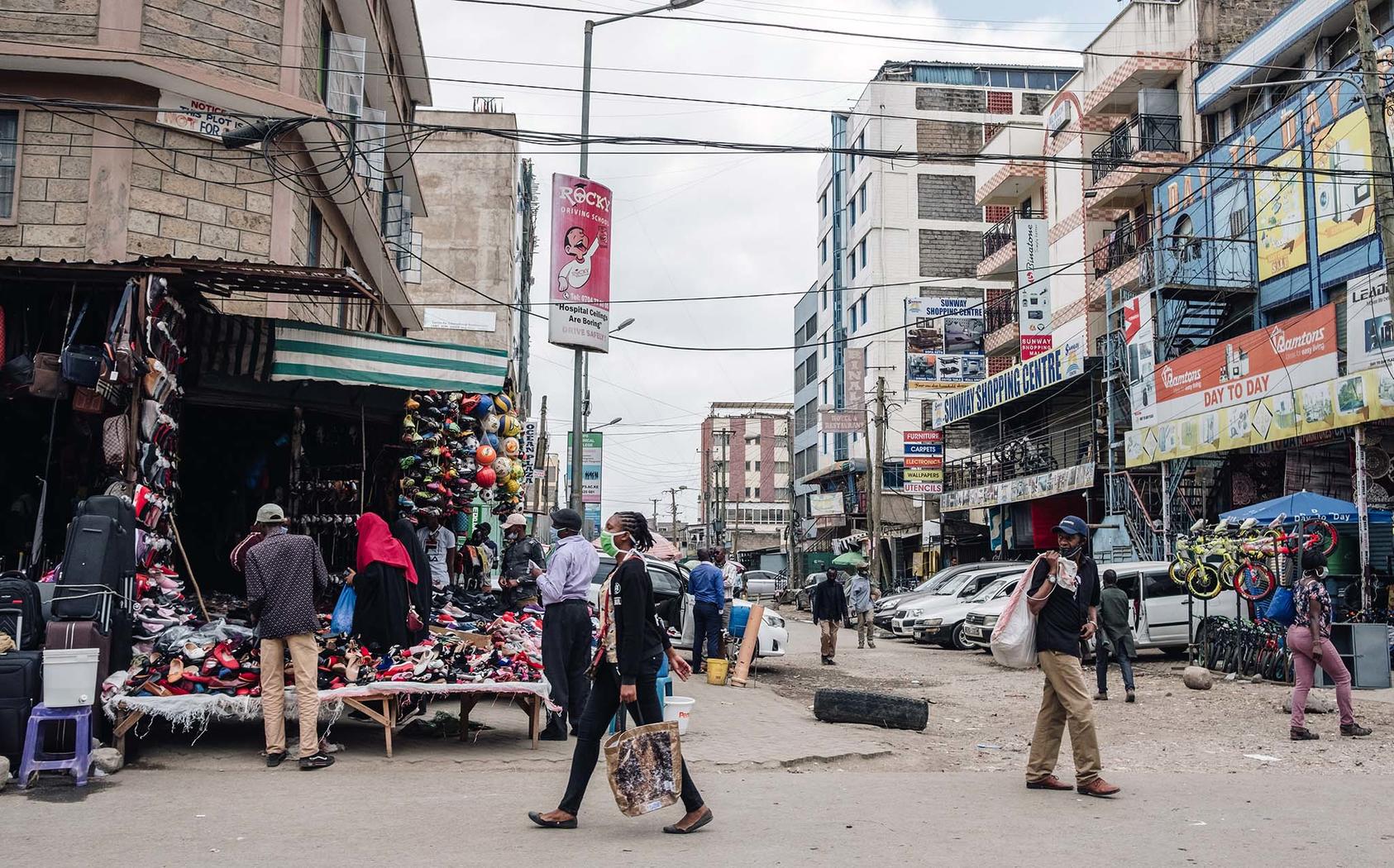 Pedestrians fill a busy street in Nairobi, Kenya. June 9, 2020. (Khadija Farah/The New York Times)