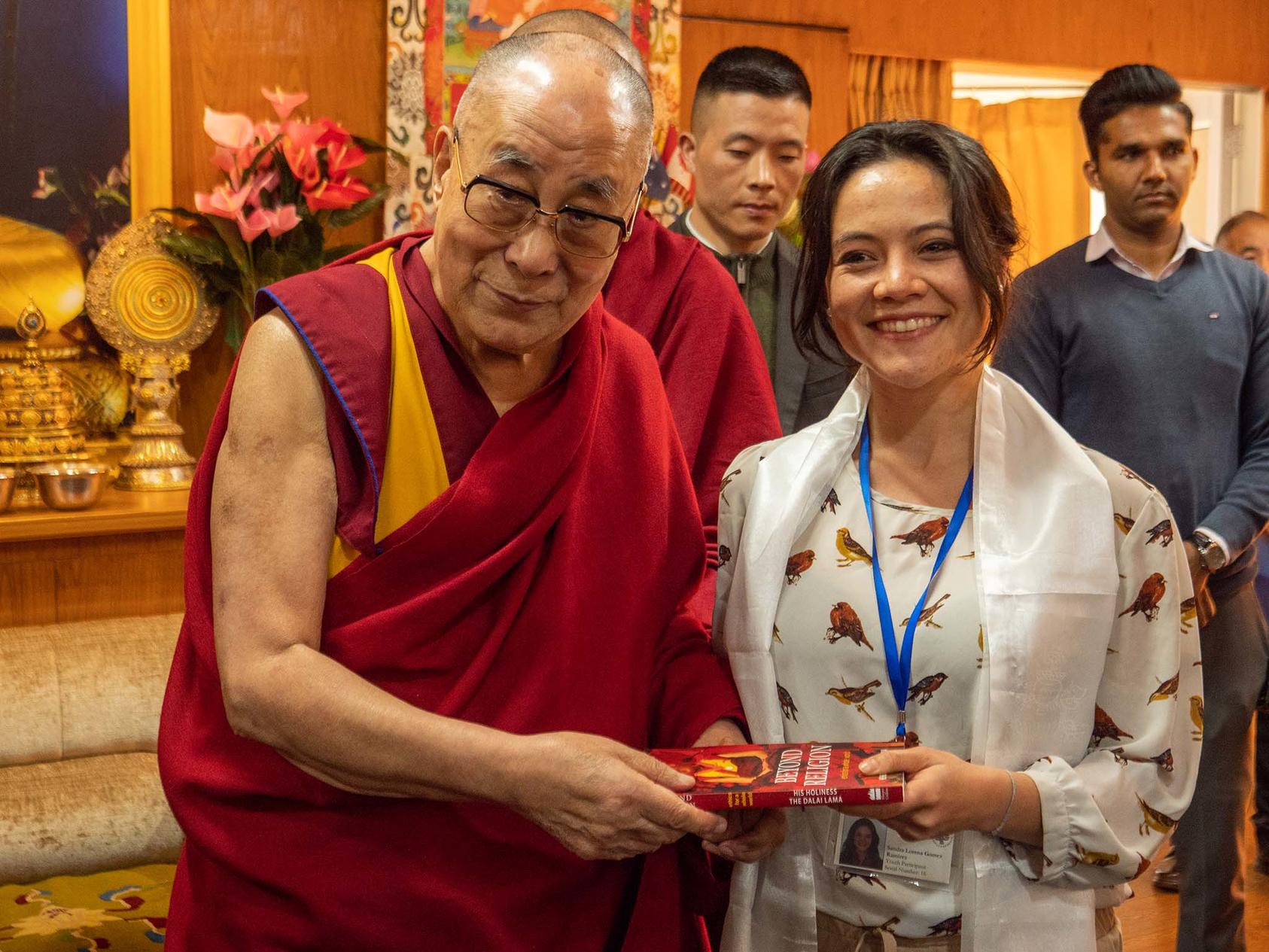 His Holiness the Dalai Lama and USIP Generation Change Fellow Lorena Gómez Ramírez during USIP's Generation Change Exchange Program in October, 2019.