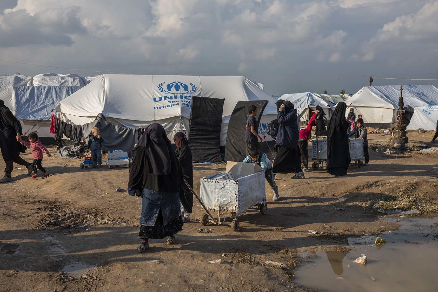 Families, ex-residents of the Islamic State, have lived since 2019 at the al-Hol camp. Governments have been slow to repatriate their citizens from this and other detention centers in Kurdish-controlled northeast Syria. (Ivor Prickett/The New York Times)