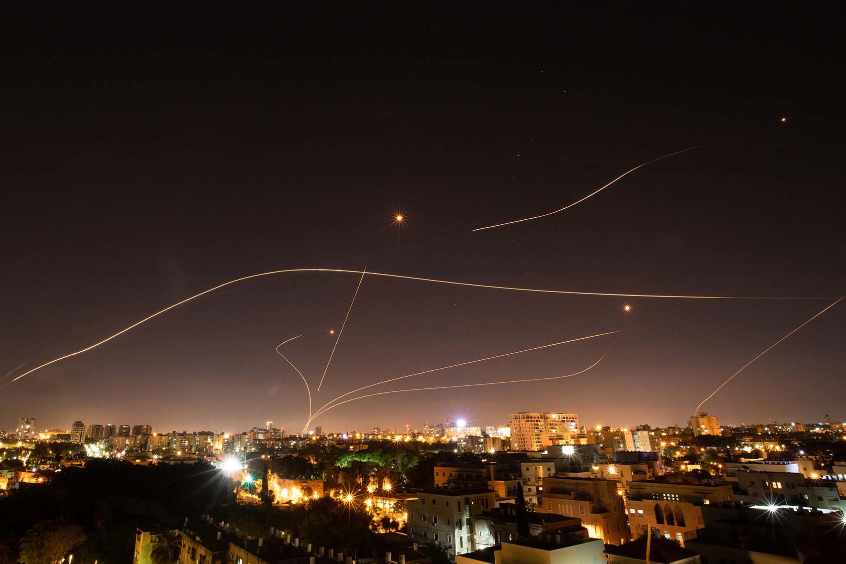 Israel’s Iron Dome missile defense system intercepts rockets launched into Tel Aviv from the Gaza Strip, May 16, 2021. (Corinna Kern/The New York Times)