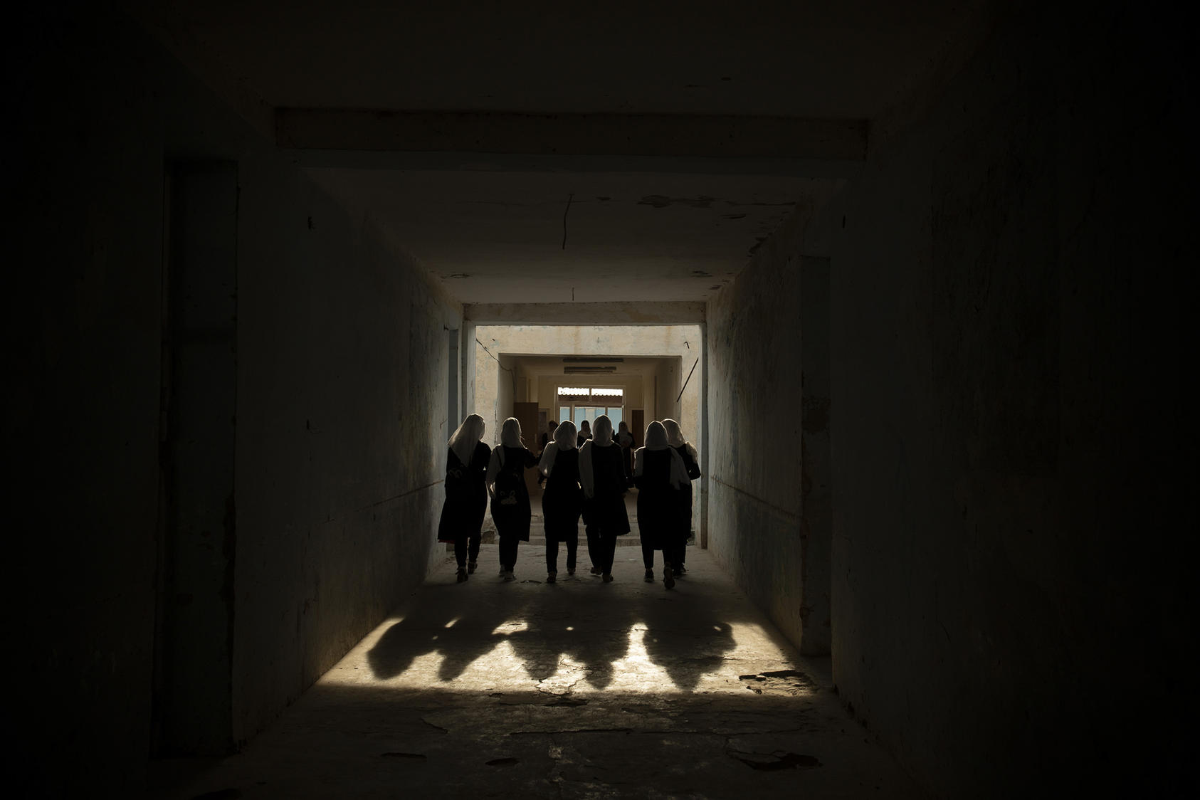 Female students inside Marshal Dostum School, where over two dozen girls from Darzab and Qosh Tepa districts study, in Sheberghan, Afghanistan, May 5, 2021. (Kiana Hayeri/The New York Times)