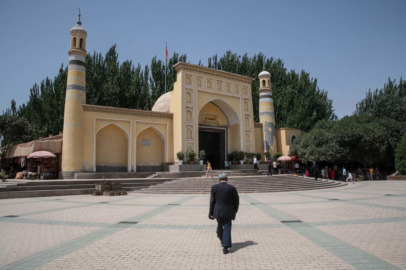 A Uyghur man heading to a mosque in Kashgar, Xinjiang, on Aug. 9, 2019. Thousands of mosques, shrines and other Islamic religious sites have been demolished in Xinjiang since 2017. (The New York Times)