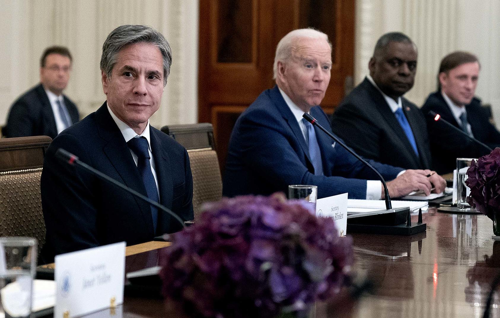 Secretary of State Antony Blinken, left, joins President Joe Biden and other administration officials in a meeting at the White House on the latest round of violence between the Israelis and Palestinians, May 21, 2021. (Stefani Reynolds/The New York Times)