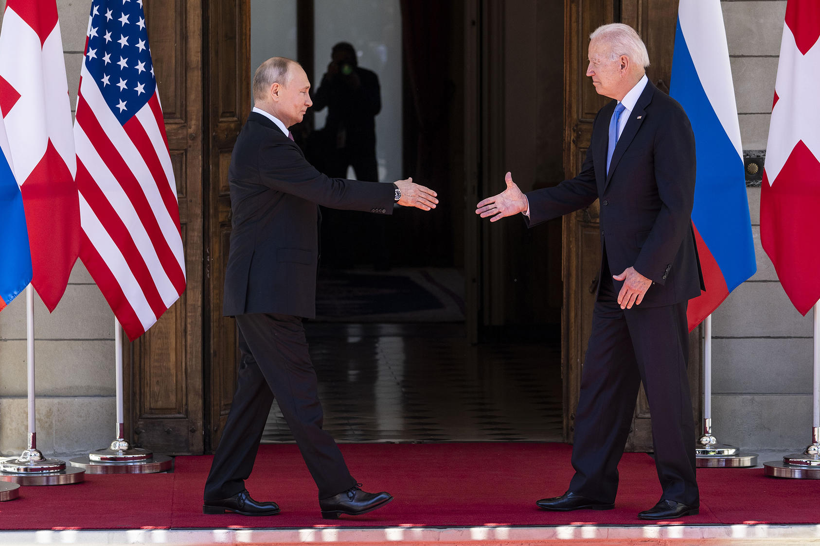 President Joe Biden and Russian President Vladimir Putin shake their hands before their first meeting at the Villa La Grange in Geneva, Switzerland, June 16, 2021. (Doug Mills/The New York Times)