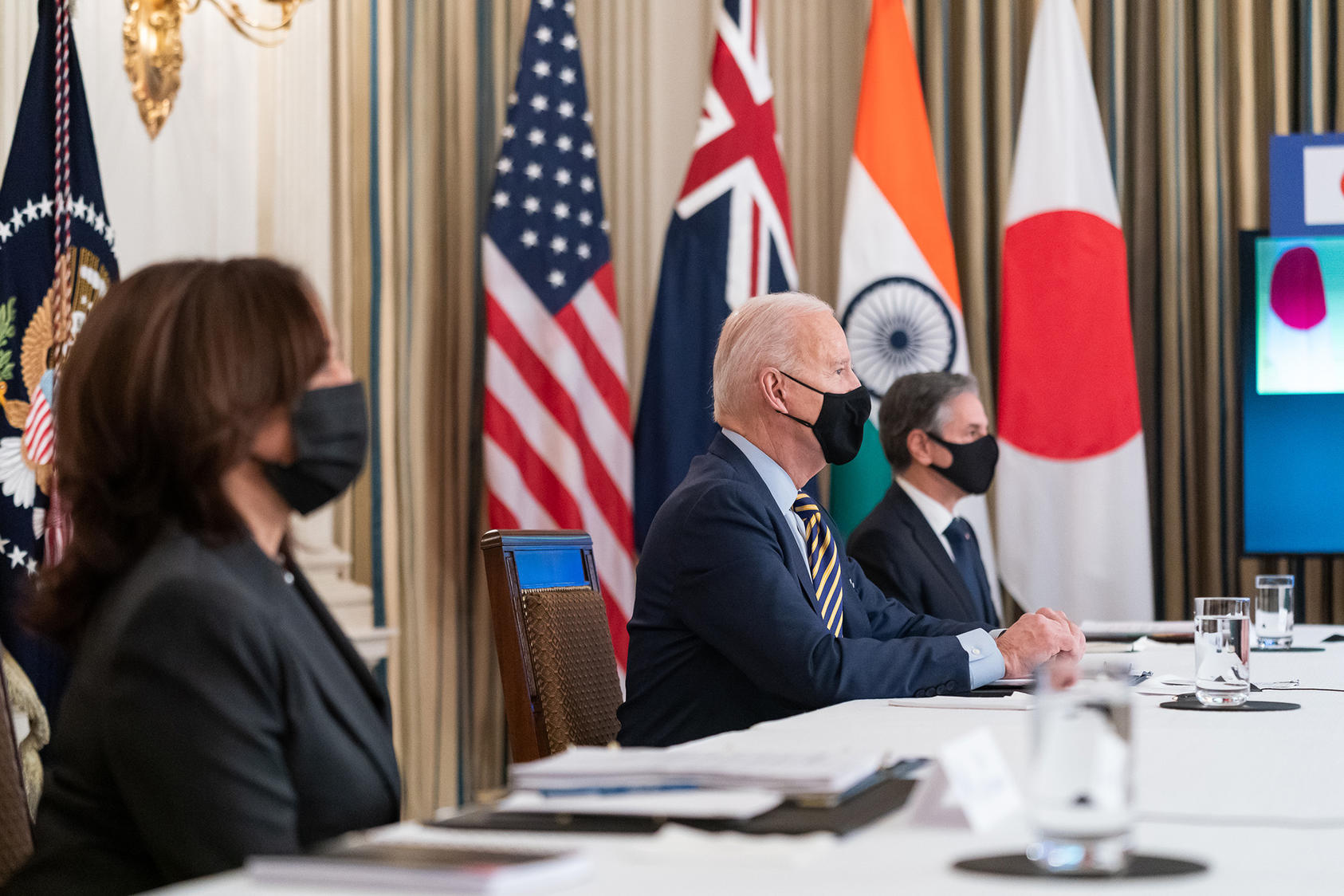 President Joe Biden, joined by Vice President Kamala Harris, Secretary of State Antony Blinken and White House staff, participates in the virtual Quad Summit with Australia, India and Japan Friday, March 12, 2021. (Adam Schultz/Official White House Photo)