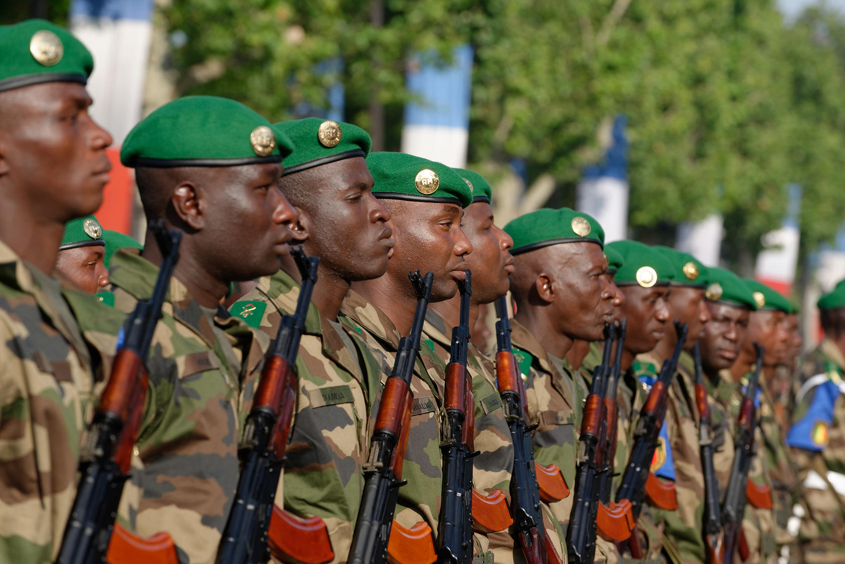 Malian troops taking part in the Bastille Day 2013 military parade on the Champs-Élysées in Paris. Since August 2020, Mali’s military has overthrown two civilian-led governments. (Marie-Lan Nguyen/Wikimedia Commons/CC-BY 2.5]