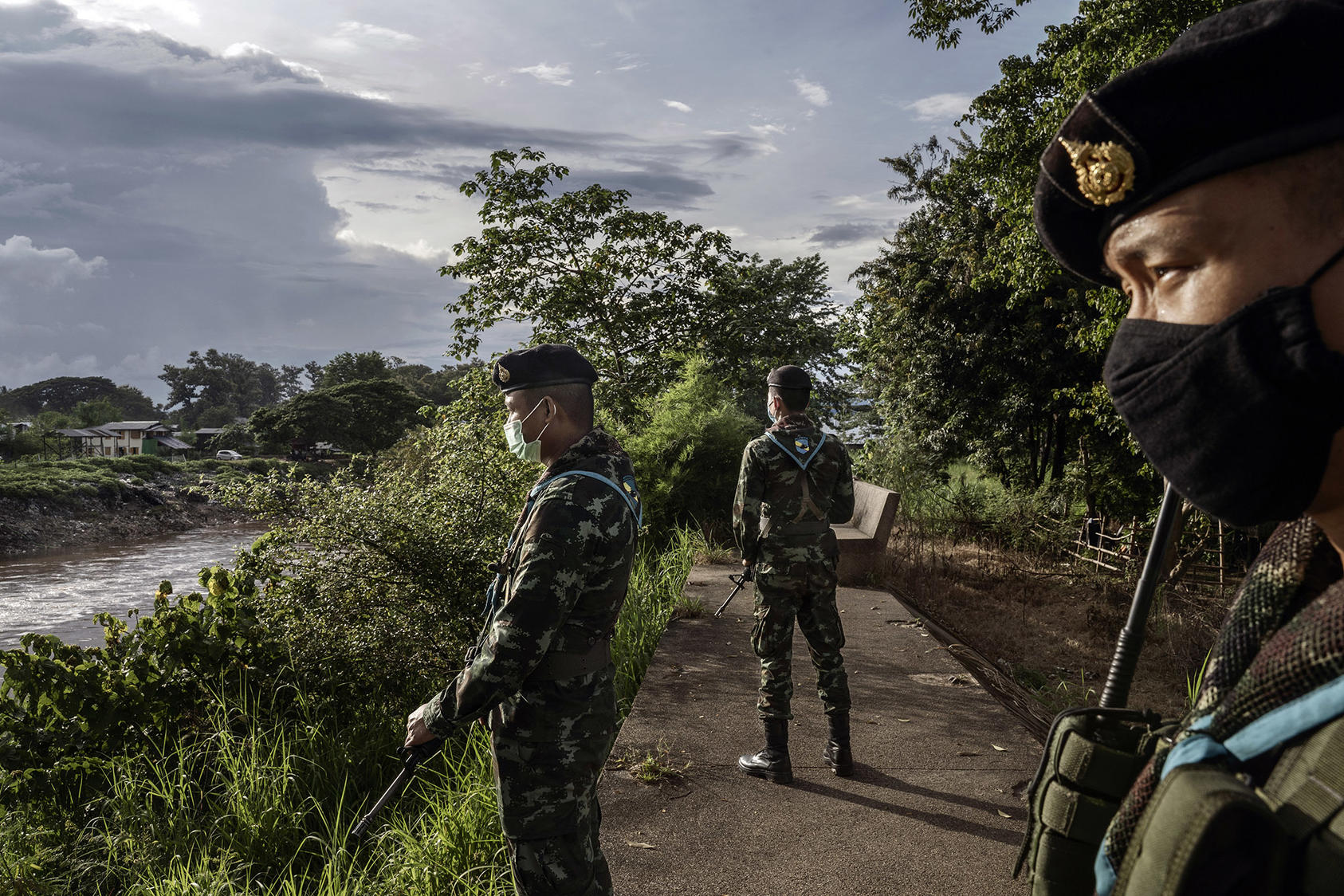 Thai solders on patrol in the border town of Mae Sot, which sits directly across the Moei River from Myawaddy, Myanmar, on Sept. 28, 2020. (Adam Dean/The New York Times)