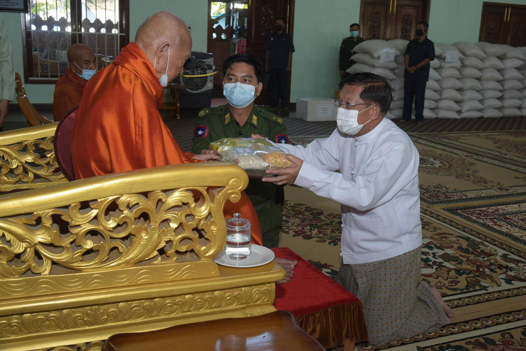 Coup leader Min Aung Hlaing meets with Buddhist leader Banmaw Sayadaw in November. (Office of the Commander-in-Chief of Myanmar’s Defense Services.)
