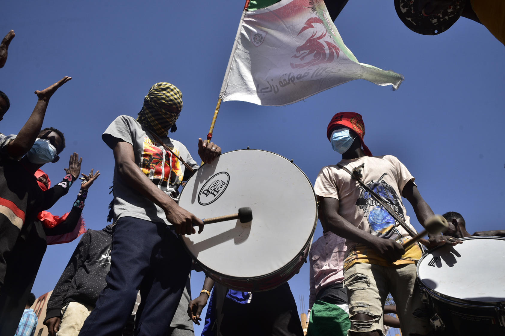 Sudanese youth rally last month in one of many protests, by tens of thousands of people, since October against Sudan’s army coup. Troops have quelled rallies by force, killing participants. (Faiz Abubakar Muhamed/The New York Times)