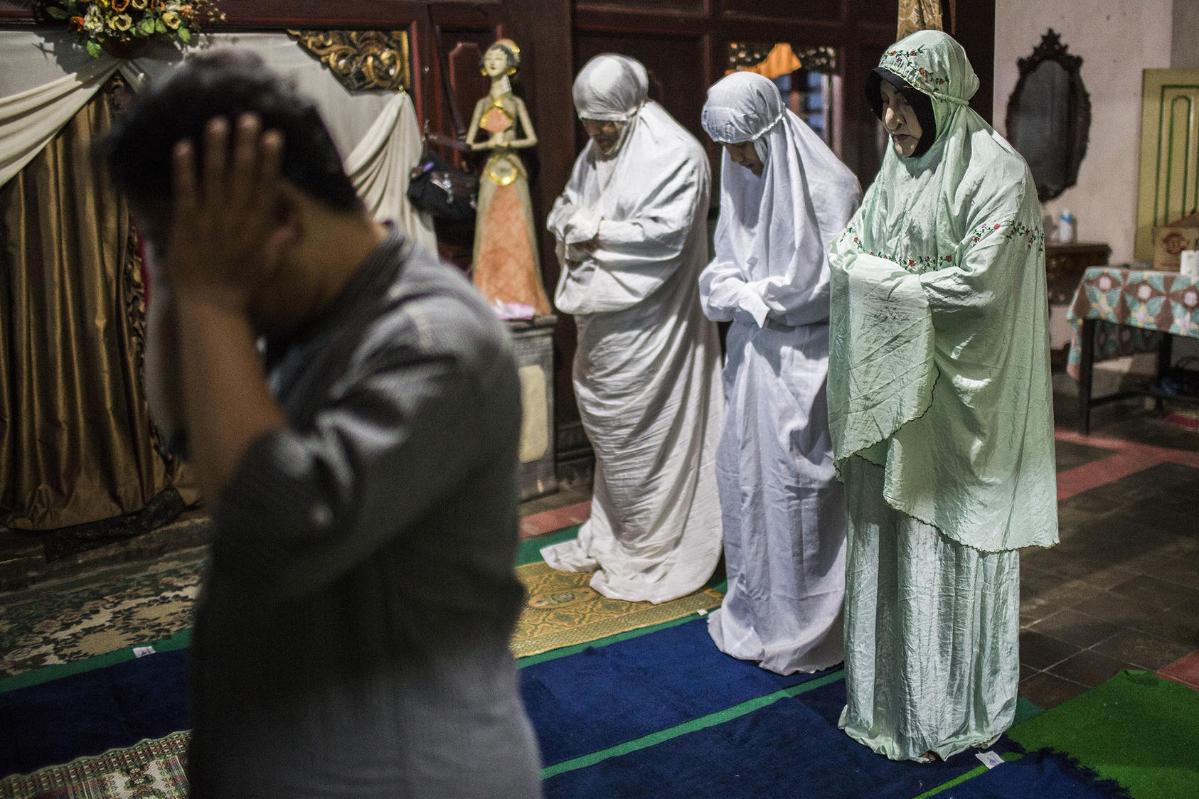 Members of Al Fatah Pesantren, possibly the only Muslim academy or madrasa for transgender people in the world, according to its leader, praying in Yogyakarta, Indonesia. December 6, 2015. (Kemal Jufri/The New York Times)