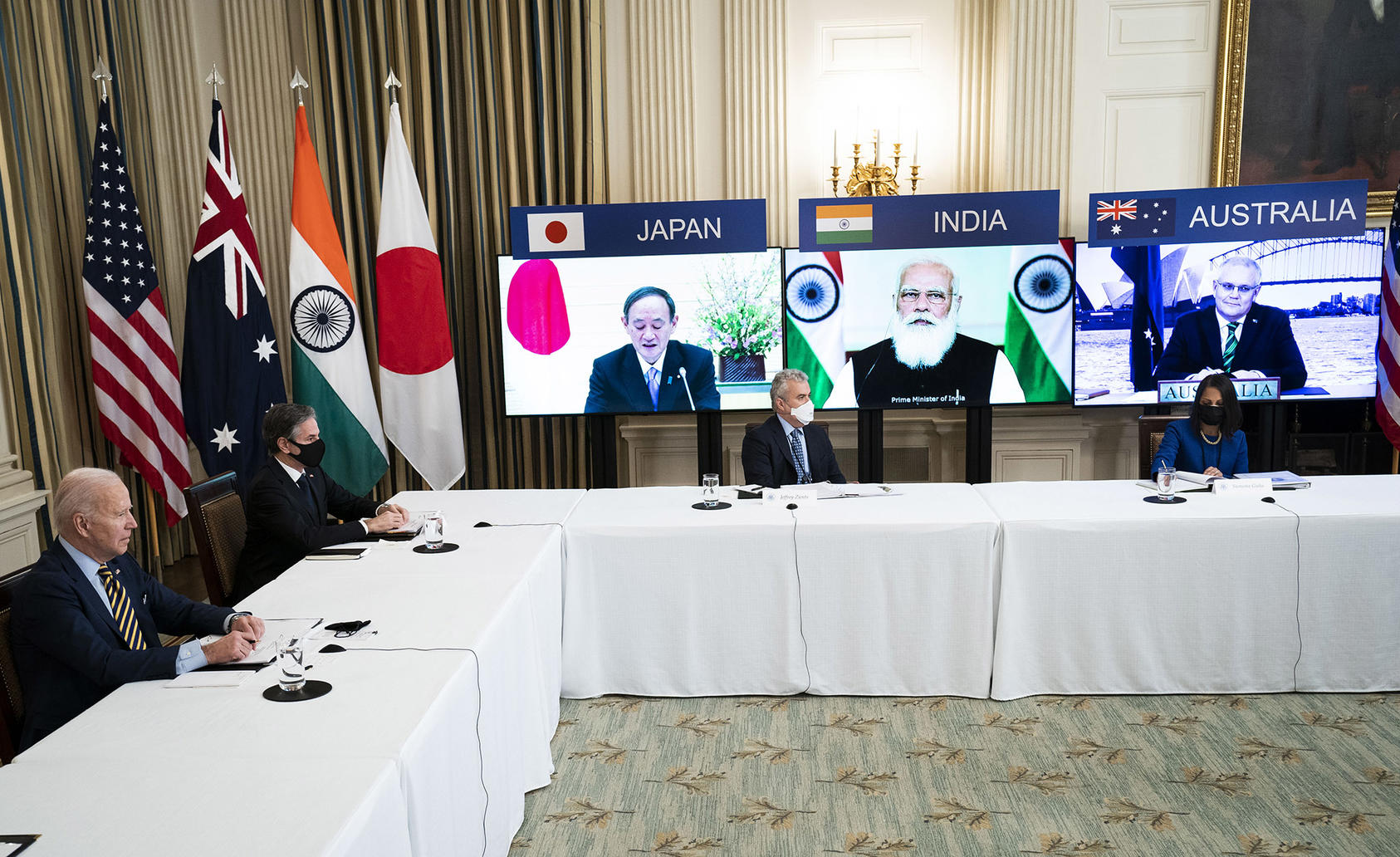 President Joe Biden meets virtually with Prime Minister Narendra Modi of India, on monitor, as well the leaders of Japan and Australia, at the White House in Washington. March 12, 2021. (Doug Mills/The New York Times)