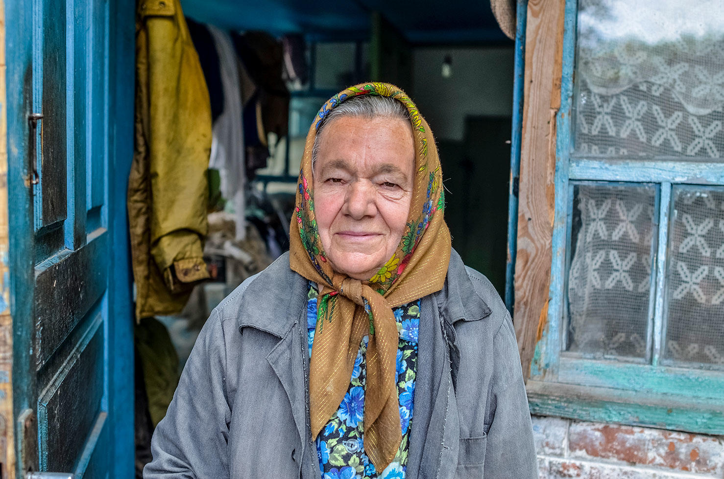 older woman in doorway