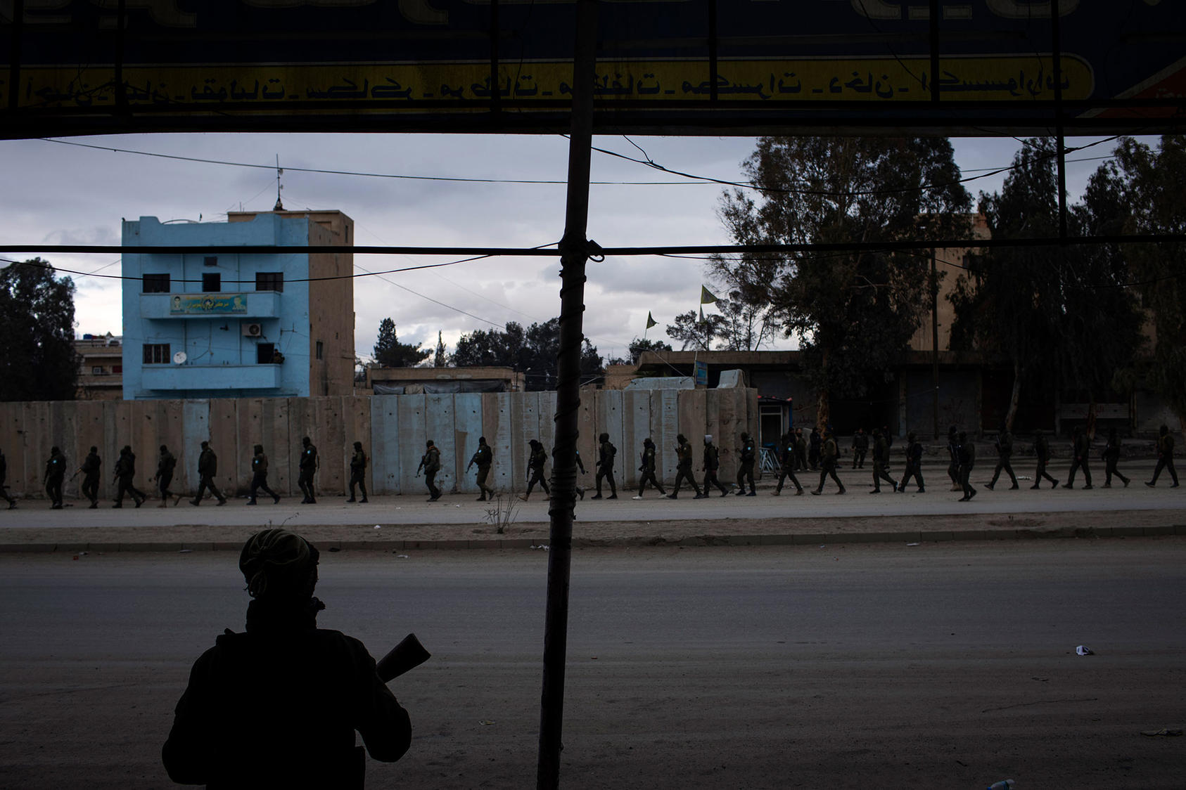 Kurdish security forces searched for escaped prisoners and Islamic State fighters on Thursday, Jan. 27, 2022, near a prison that was attacked last week in Hasakeh, Syria. (Diego Ibarra Sanchez/The New York Times)