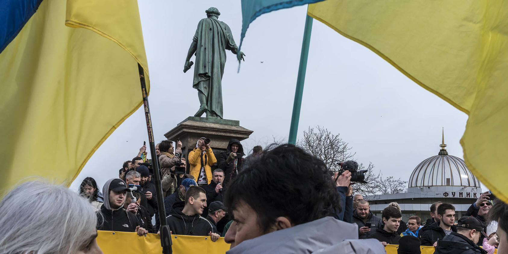 Ukrainian demonstrators march in the port of Odessa, four days before Russia’s new invasion in February, to renew demands for democratic, transparent governance from Ukraine’s Euromaidan uprising eight years earlier. (Brendan Hoffman/The New York Times)