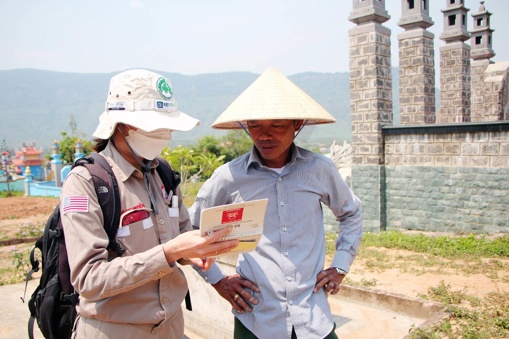 Nguyen Ngoc Nhien interviews a local informant to gather evidence of exploded ordnance contamination in Huang Hoa district, Quang Tri province, Vietnam. (Project RENEW)