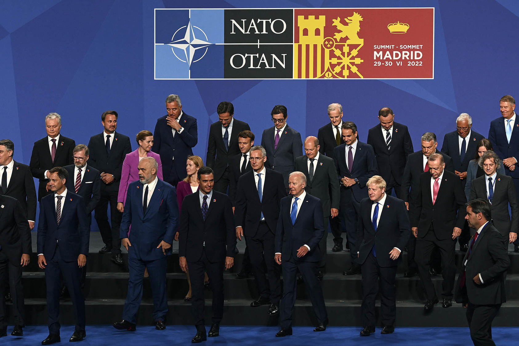 NATO leaders leave the podium after their formal group photo at the alliance’s summit conference in Madrid, where they reaffirmed NATO’s support for Ukraine’s self-defense against Russia’s invasion. (Kenny Holston/The New York Times)