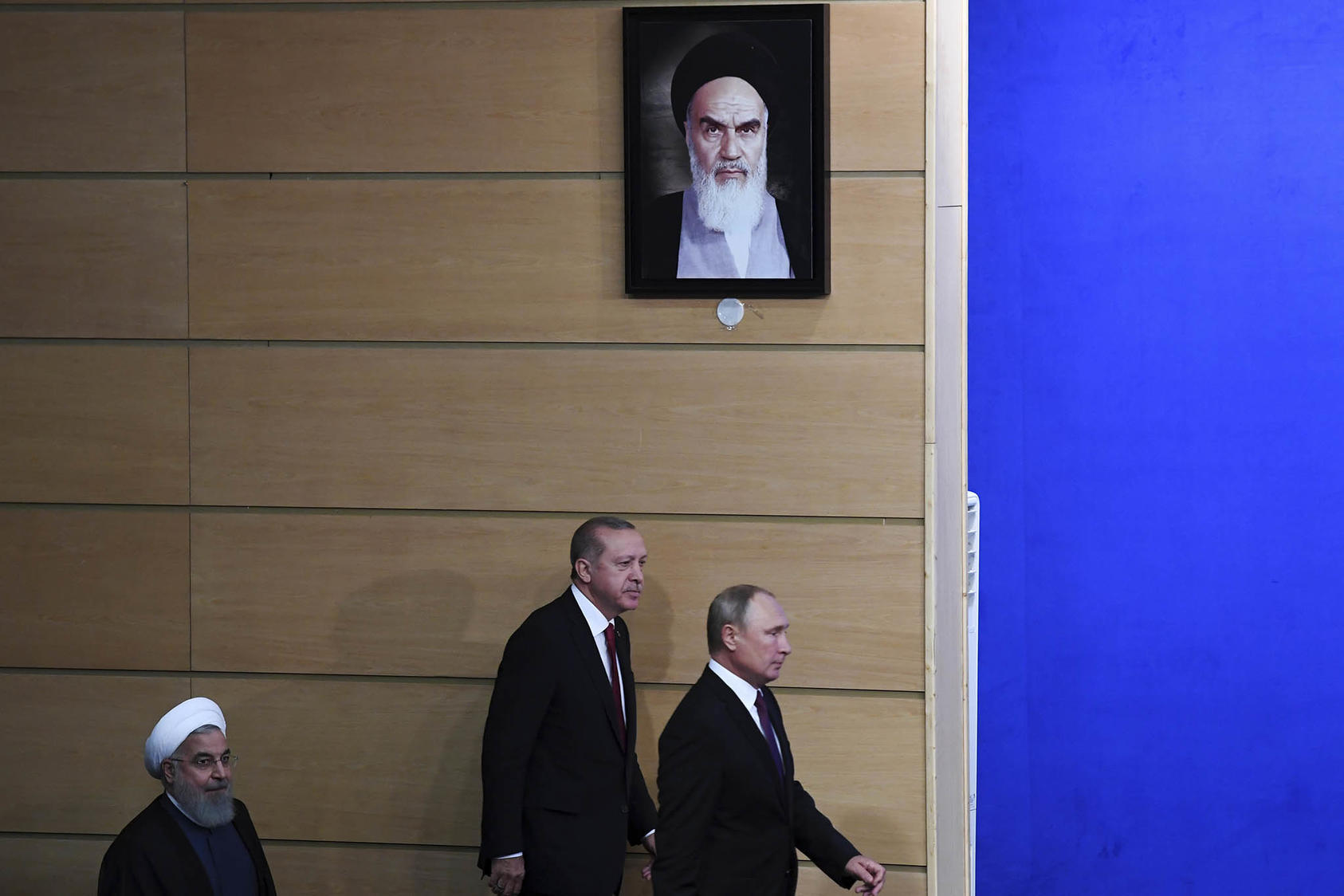 From left, former Iranian President Hassan Rouhani, Turkish President Recep Tayyip Erdogan and Russian President Vladimir Putin meet to discuss Syria, in Tehran, Sept. 7, 2018. (Kirill Kudryavtsev/Pool via The New York Times)