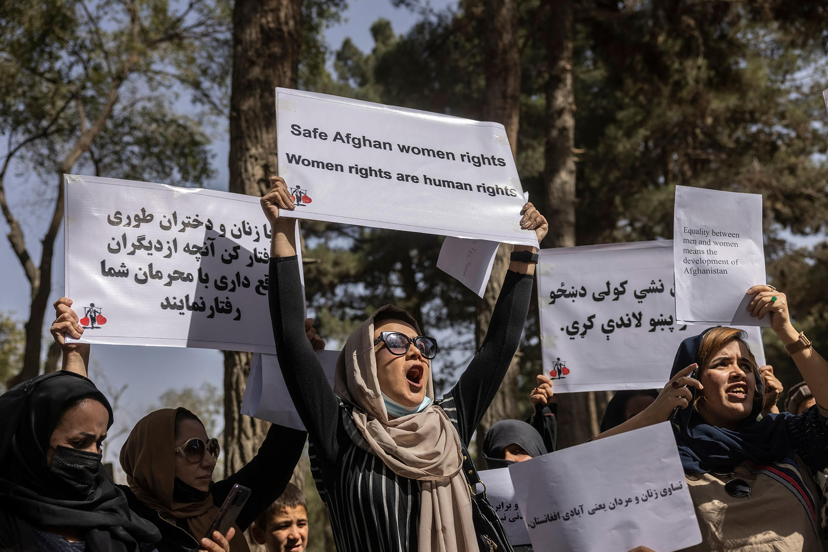 Afghan women protest for their rights under Taliban rule in Kabul, Afghanistan. October 10, 2021. (Victor J. Blue/The New York Times)