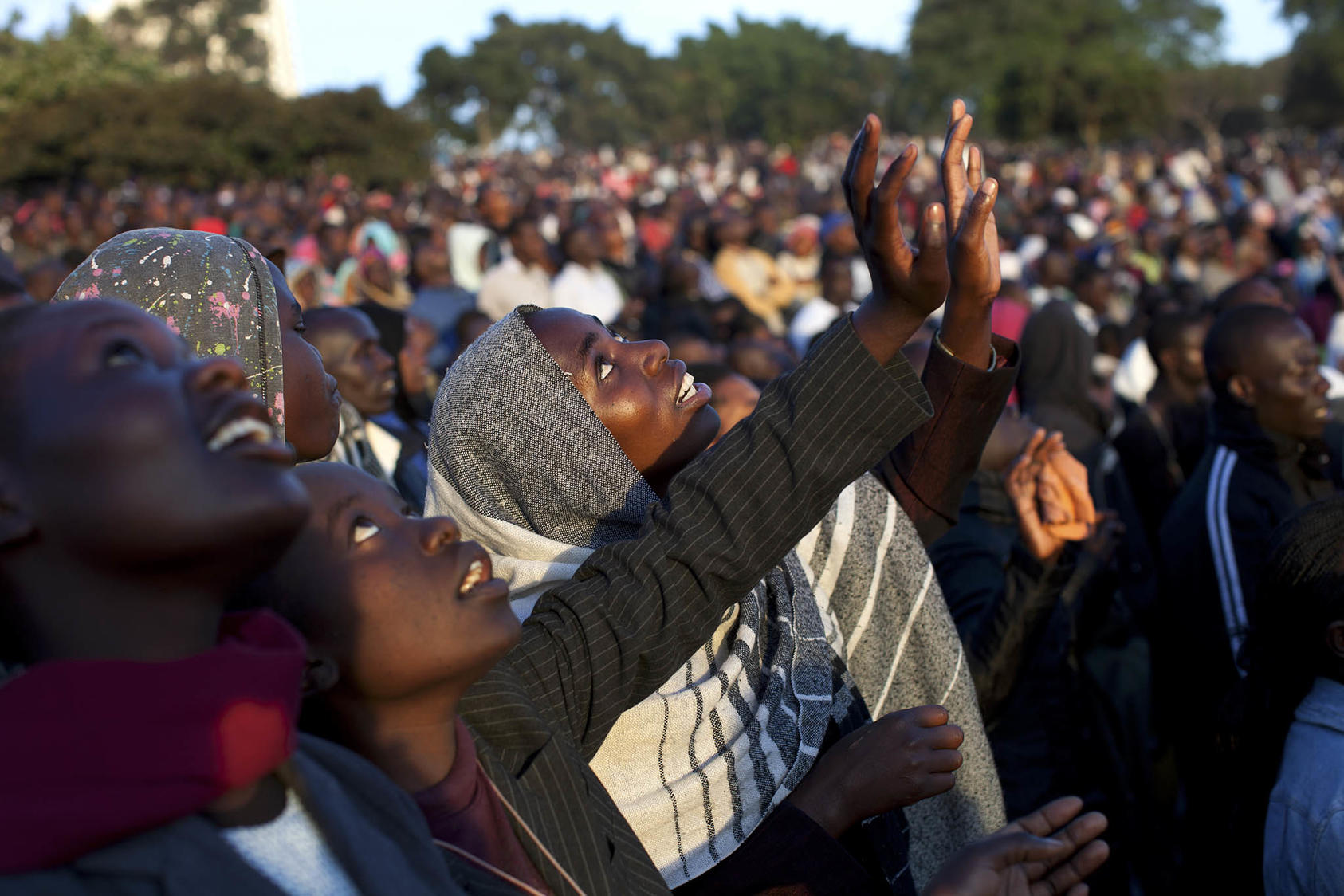 People gather at a rally to pray for peaceful elections at Uhuru Park in Nairobi, Kenya. Feb. 24, 2013. (Tyler Hicks/The New York Times)