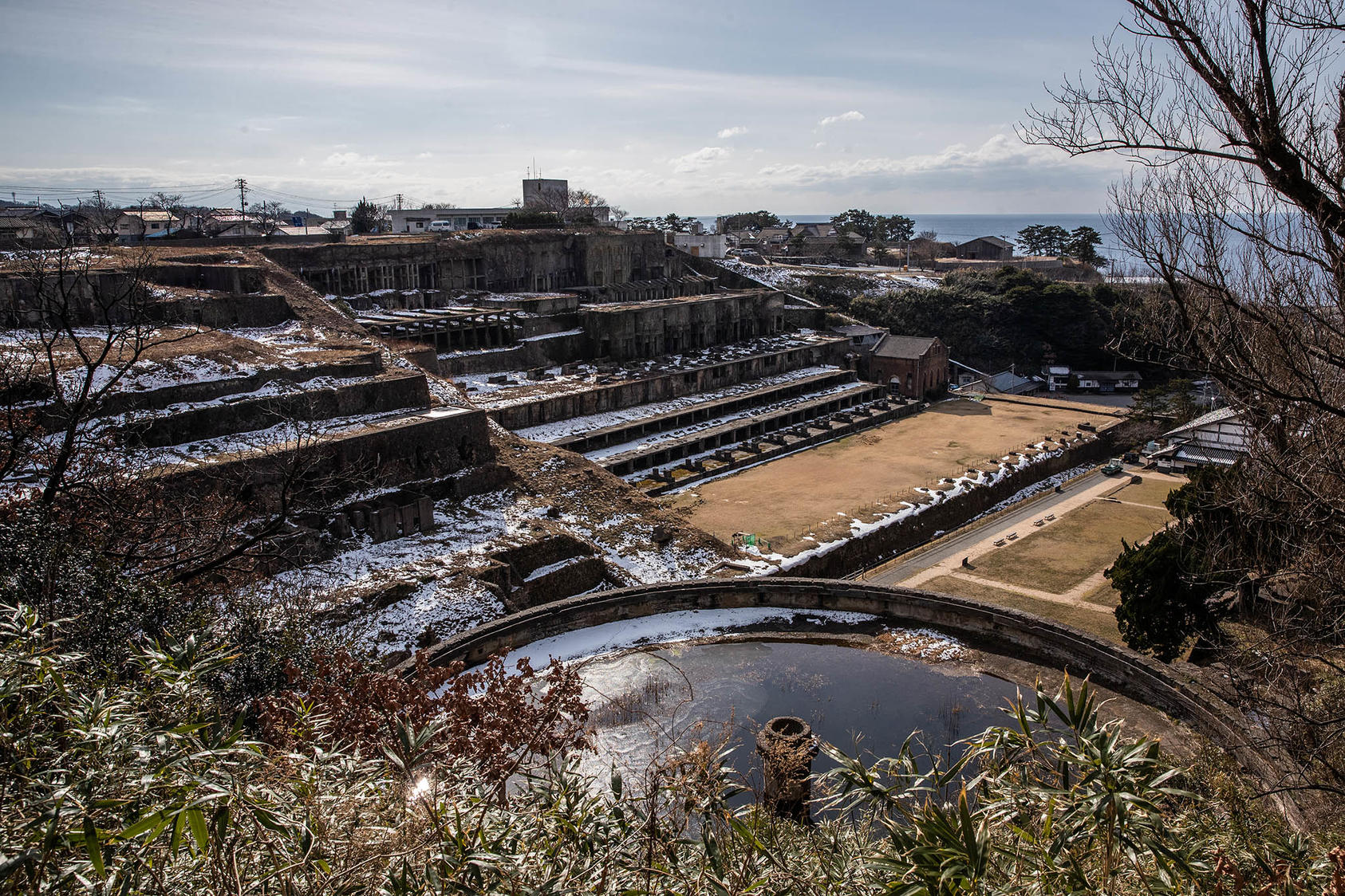 The ruins of the Kitazawa flotation plant on Japan’s Sado Island, Feb. 2022. A bid for a UNESCO World Heritage designation is the latest flash point between Japan and South Korea over Japanese abuses during World War II. (Shiho Fukada/The New York Times)