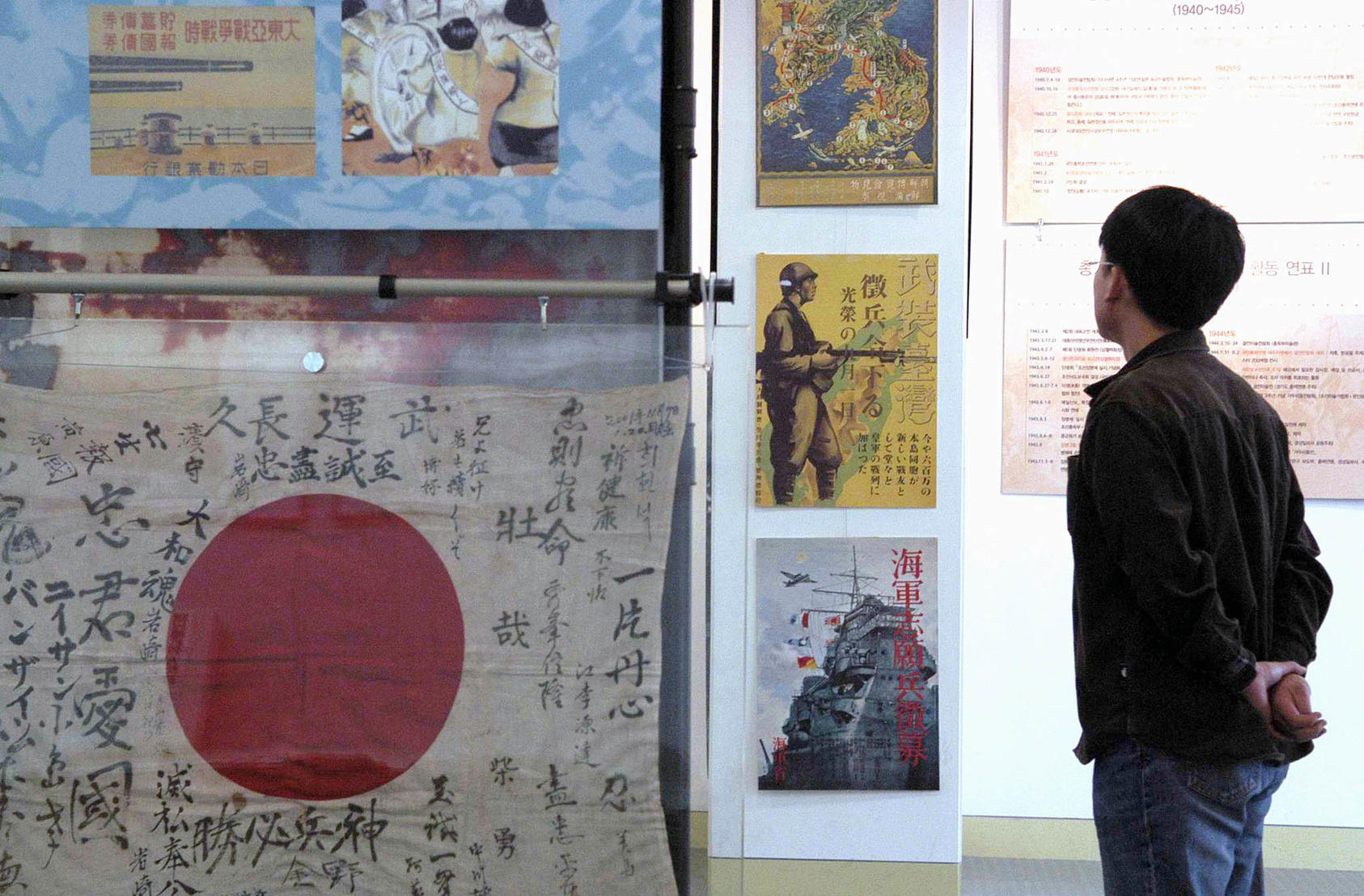A museum exhibit of pro-Japanese posters from the imperial era, 1910 to 1945, in Seoul, South Korea. December 13, 2004. (Seokyong Lee/The New York Times)