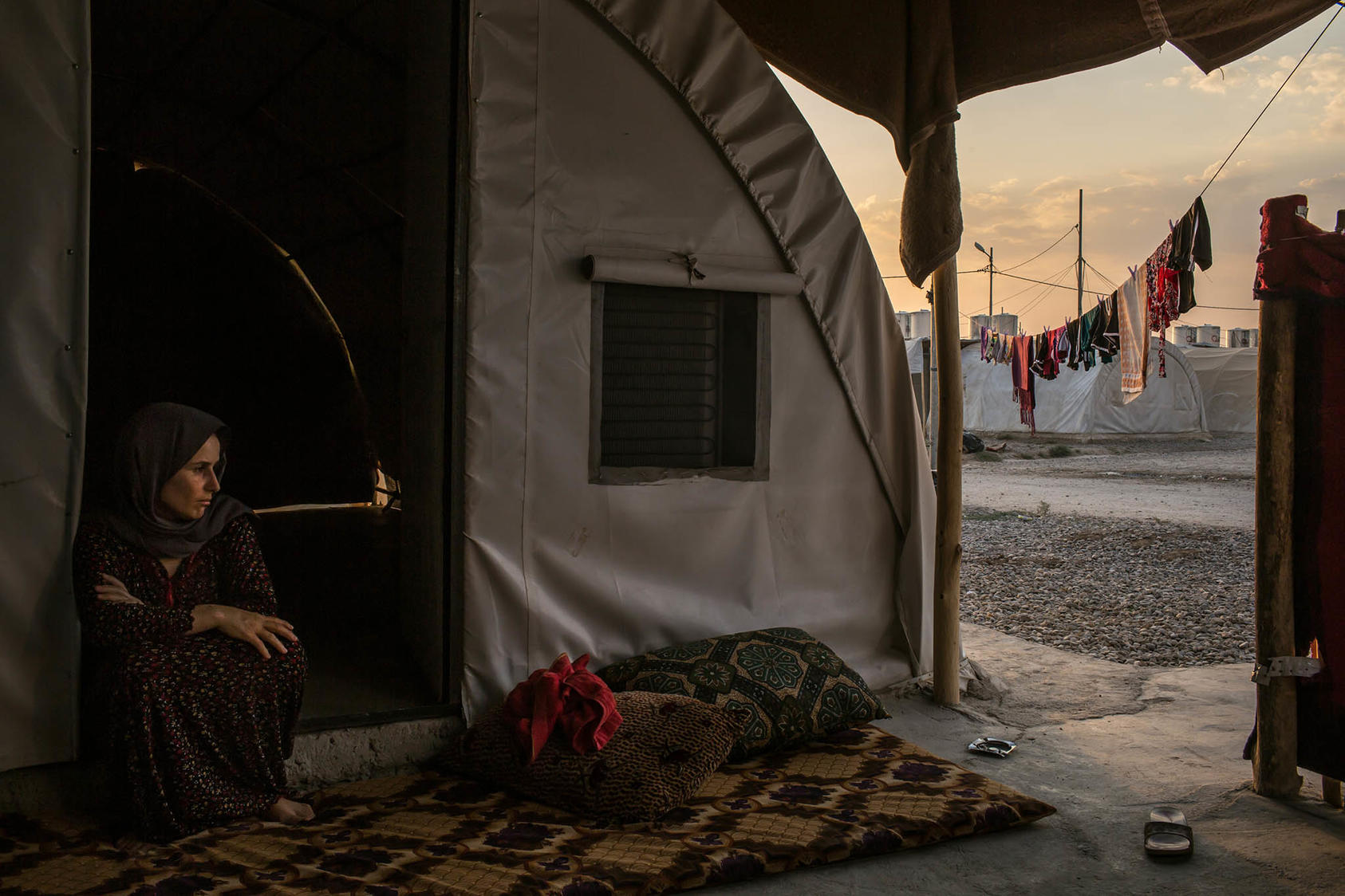 A Yazidi woman in a refugee camp outside Dohuk, Iraq. July 24, 2015. Many Yazidi women were subjected to sexual slavery by the Islamic State. (Mauricio Lima/The New York Times)