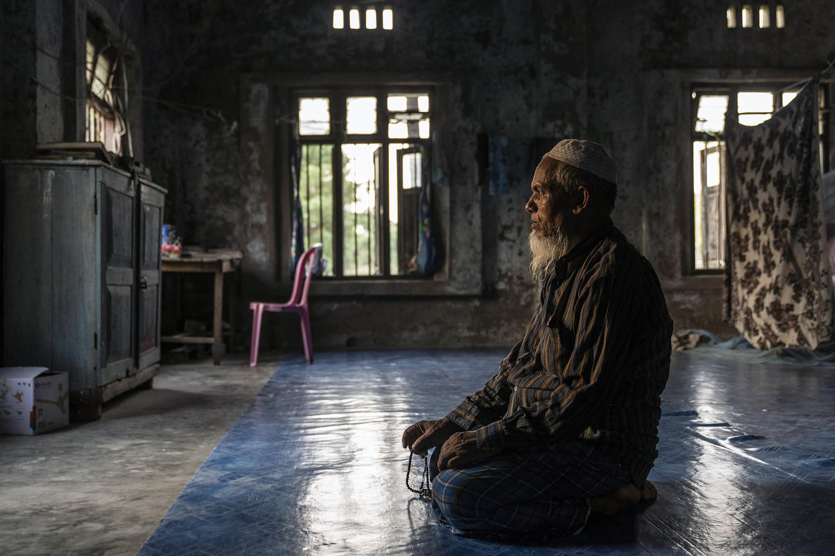 A Rohingya Muslim man prays in one of the few undamaged mosques in Ngan Chaung in northern Rakhine State, Myanmar, on May 29, 2019. (Photo by Adam Dean/New York Times)
