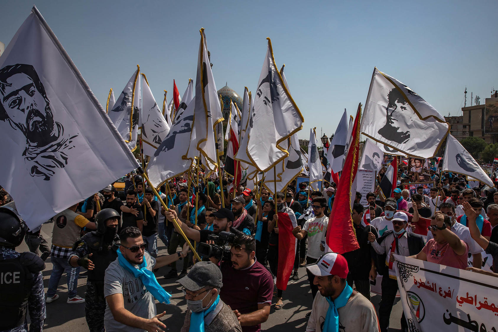 A demonstration commemorates activists killed by security forces and militia gunmen, in Baghdad, Oct. 1, 2021. (Andrea DiCenzo/The New York Times)