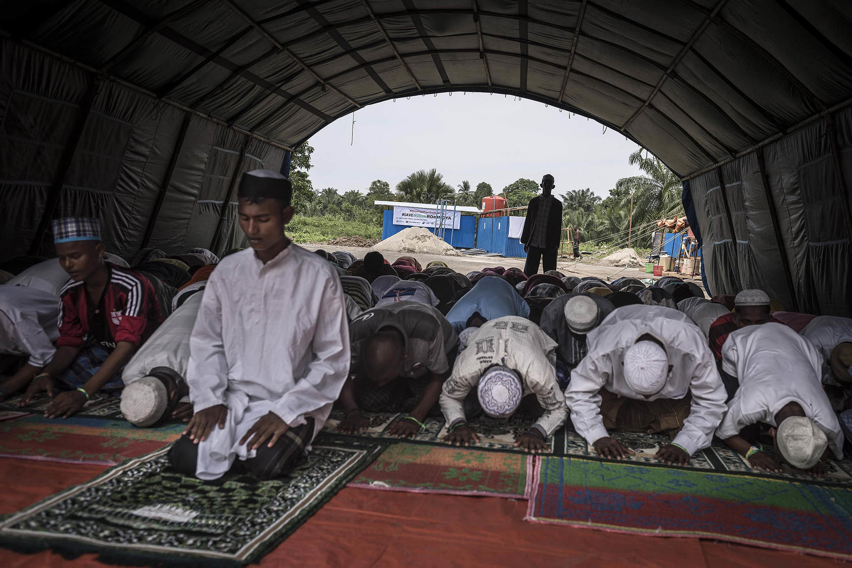 Rohingya men pray in Bayeun, Indonesia, May 25, 2015. Amid a global rise in repression religious minorities like the Rohingya, continued U.S. leadership is vital to advancing international religious freedom. (Sergey Ponomarev/The New York Times)