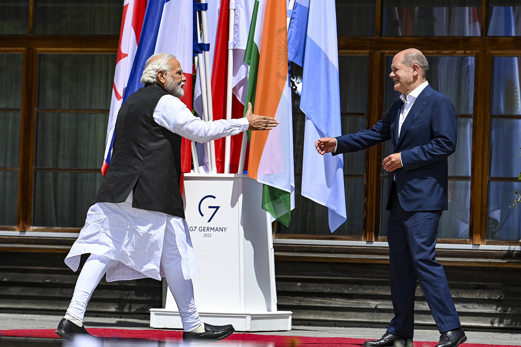 Indian Prime Minister Modi greets German Chancellor Scholz at the 2022 G-7 summit in Germany. In 2023, India will look to burnish it international influence as it chairs the G-20 and Shanghai Cooperation Organization. (Kenny Holston/The New York Times)