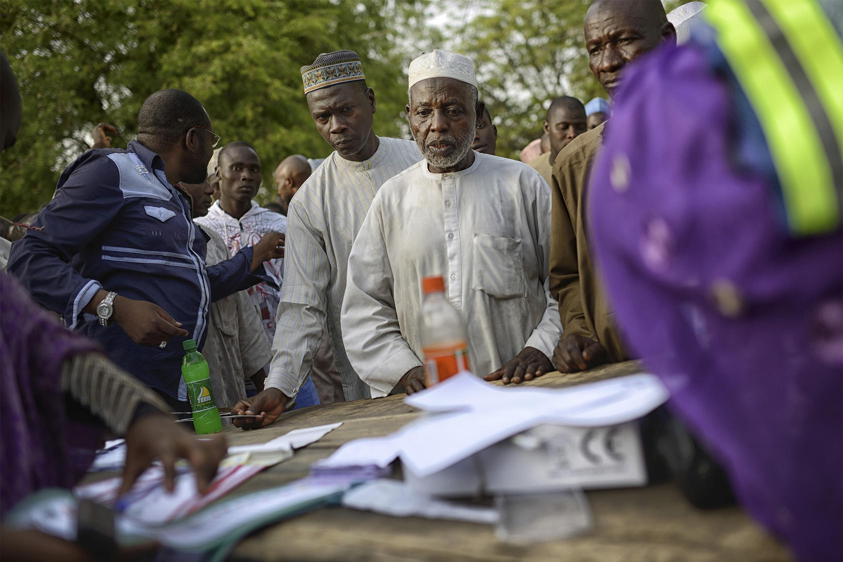 Voters line up as Nigeria elected President Muhammadu Buhari in 2015. As they elect his successor, Nigerians agree on making their democracy more inclusive of their many communal groups. They are debating how to do it.