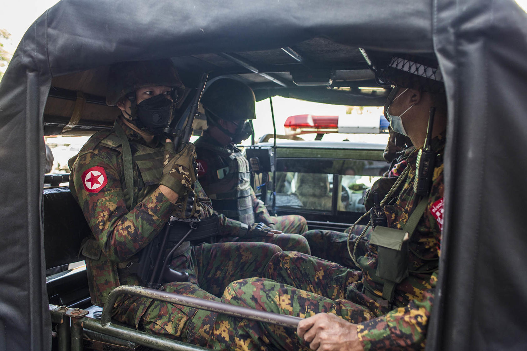 Soldiers in a truck on the streets of Yangon, Myanmar, Tuesday, Feb. 2, 2021. Beijing has begun to hedge its support for the military junta as its position grows weaker and Western support for the opposition grows. (The New York Times)