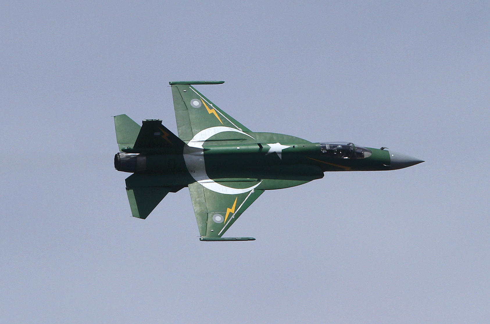 A JF-17 jet, jointly manufactured by China and Pakistan, flies over Islamabad, Pakistan, during a Defense Day celebration on September 6, 2015. (Photo by Anjum Naveed/AP)