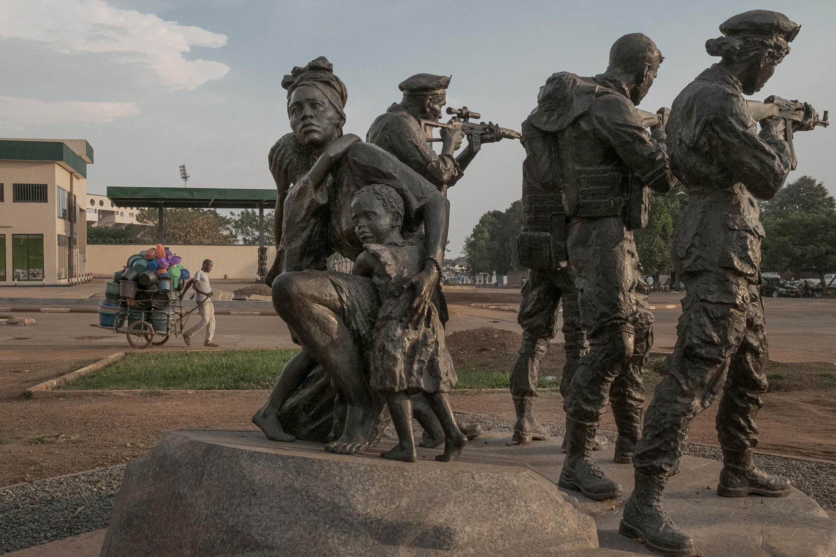 A statue in Bangui, CAR, depicts Wagner Group soldiers protecting a woman and children. Billboards, films and social media campaigns also promote Wagner’s operations to publics in several countries of the Sahel. (Mauricio Lima/The New York Times)