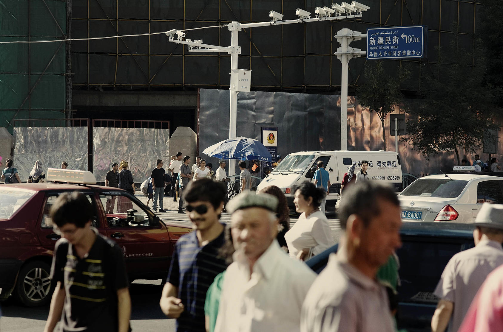 A set of surveillance cameras at a busy crossroad in Urumqi, Xinjiang’s capital in China, on July 20, 2010. (The New York Times)