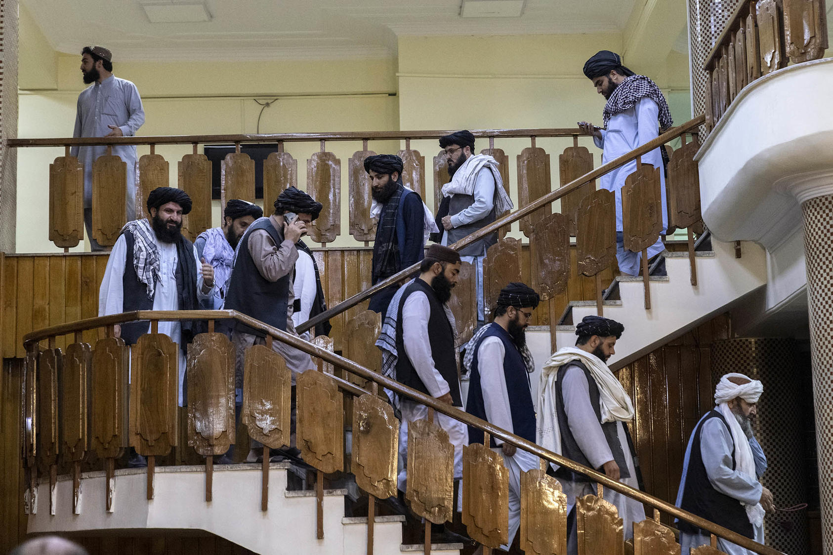 Taliban officials arrive at a news conference to announce an acting cabinet for the new Taliban government in Kabul on Tuesday, Sept. 7, 2021. (Victor J. Blue/The New York Times)