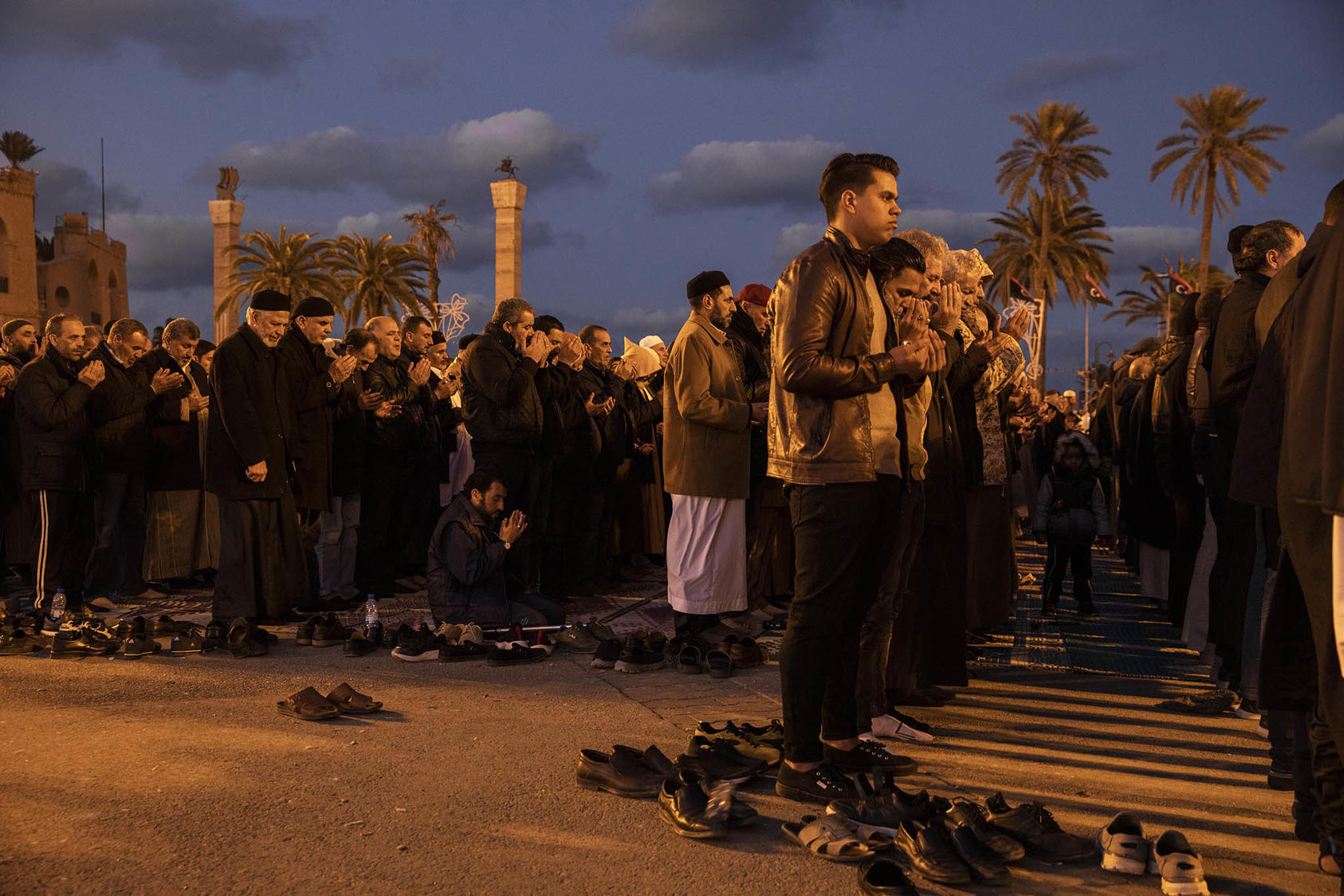 Libyans pray in Martyrs’ Square in the country’s capital, Tripoli, Jan. 17, 2020. (Ivor Prickett/The New York Times)