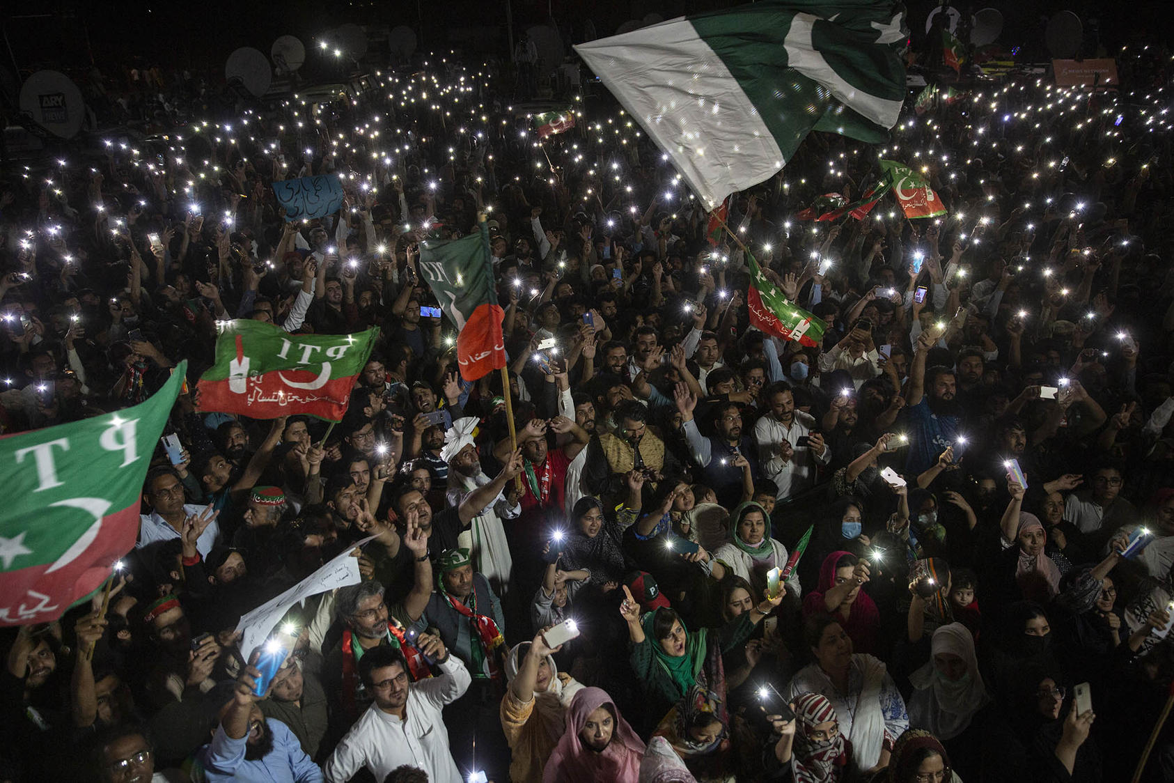 Backers of former Prime Minister Imran Khan rally in April 2022 against his ouster from office. As Khan seeks to regain power, his arrest triggered violent protests directed largely at the politically powerful military. (Saiyna Bashir/The New York Times)