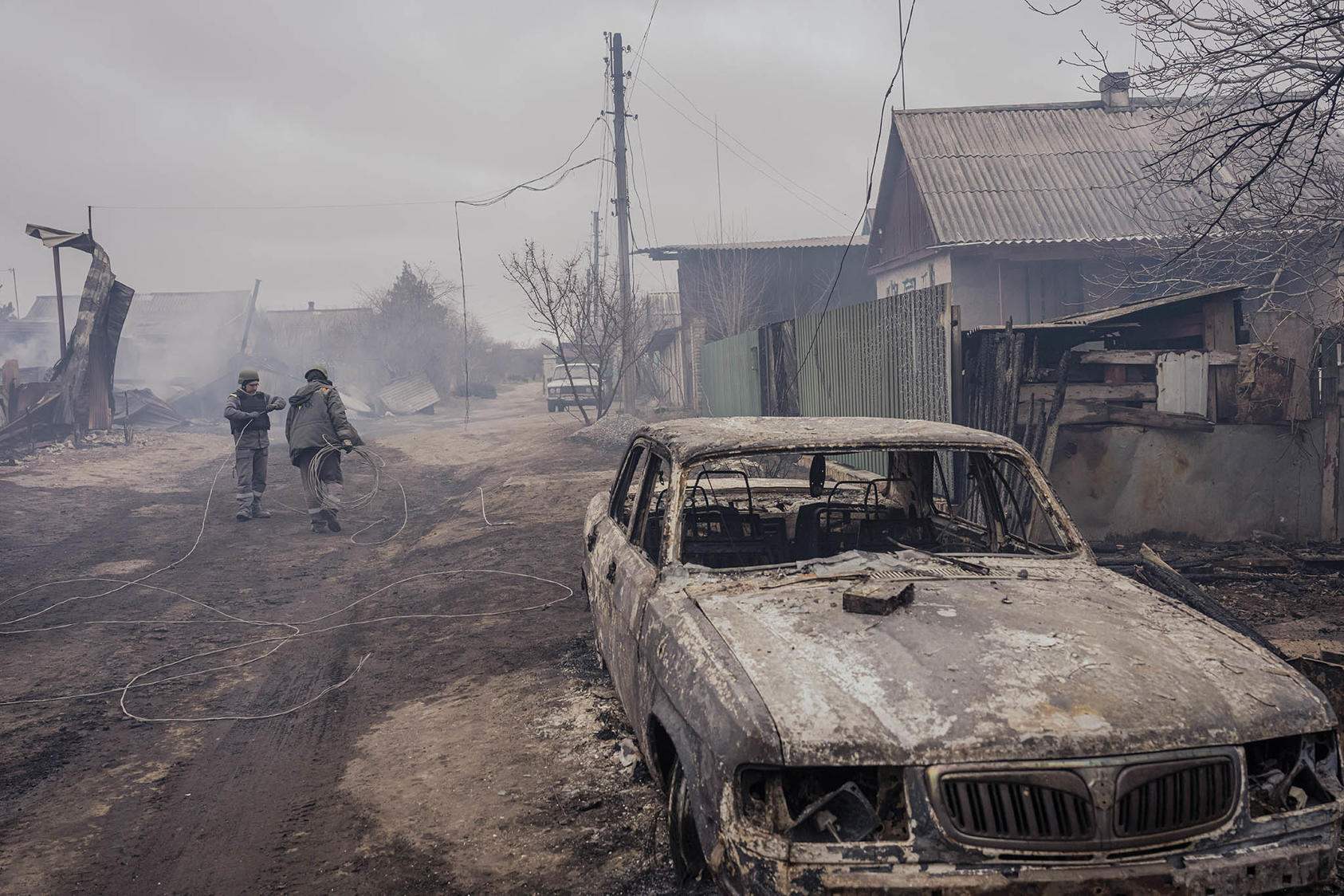 The aftermath of a Russian rocket strike in Kostyantynivka, Ukraine, 10 miles west of Bakhmut, March 18, 2023. (Daniel Berehulak/The New York Times)
