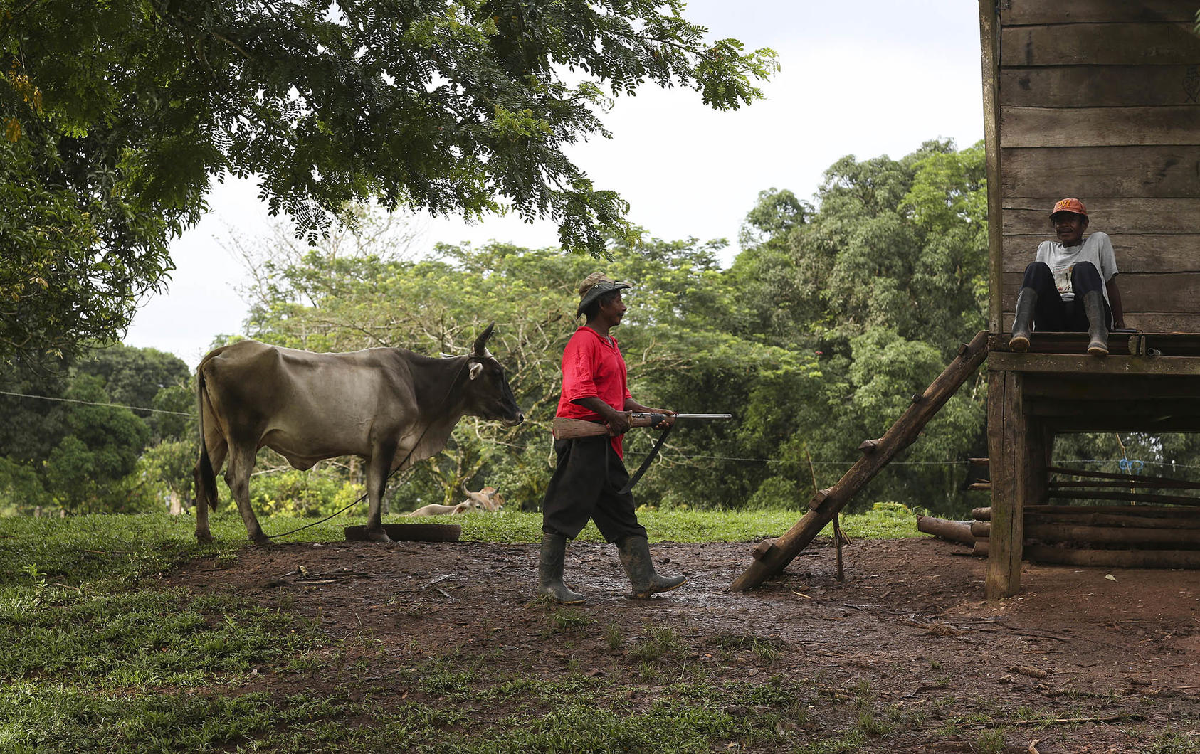Men of Nicaragua’s Miskito people guard their homes in Nicaragua, one of many countries where Indigenous groups face violence, including attacks by powerful interests trying to exploit their biodiverse homelands. (Oswaldo Rivas/The New York Times)