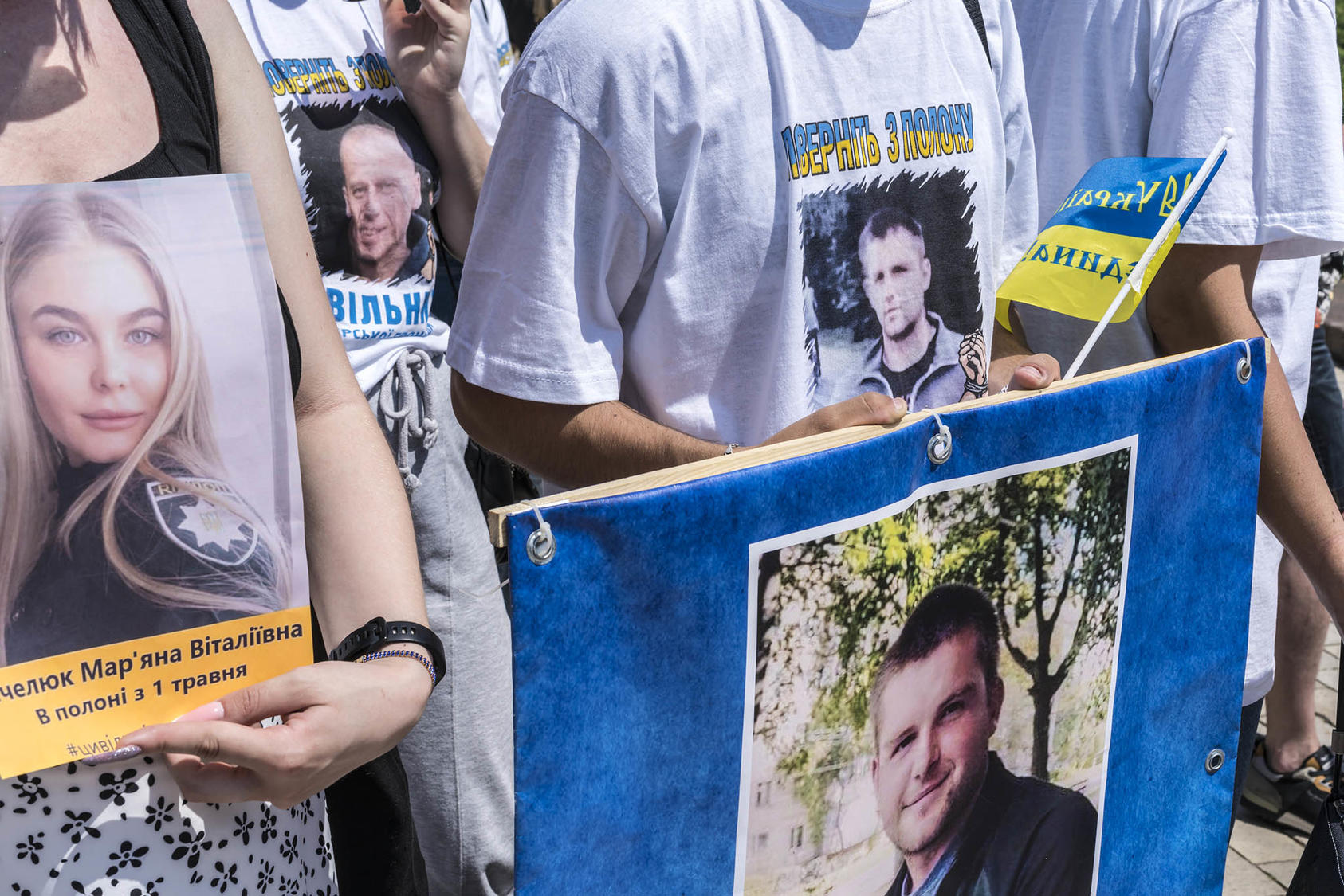 Protesters in Kyiv show portraits of Ukrainians, many civilians, seized by Russia in the war. As their army’s counteroffensive has begun, Ukrainians say their will to resist Russian rule has only grown over the war. (Brendan Hoffman/The New York Times)