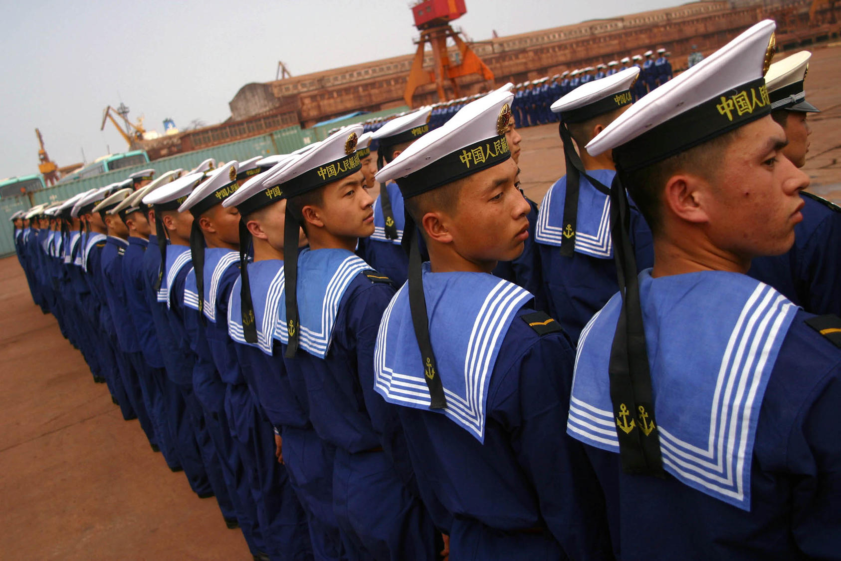 Chinese Navy sailors in Zhanjiang, China. China’s Naval fleet is the largest in the world as of 2014, although the U.S. Navy is still considered more powerful. (Nelson Ching/The New York Times)
