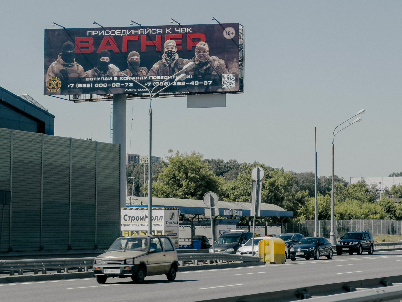 Masked fighters on a Moscow billboard invite recruits to the Wagner Group before its mutiny. Its founder, Yevgeniy Prigozhin, is campaigning to keep his role in running Wagner operations in conflict-torn African states. (Nanna Heitmann/The New York Times)