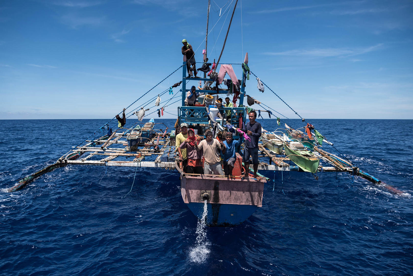 Filipino fisherman aboard a boat near Scarborough Shoal, a disputed reef in the South China Sea that China seized from the Philippines in 2012, off the coast of the Philippines, June 18, 2016. (Sergey Ponomarev/The New York Times)