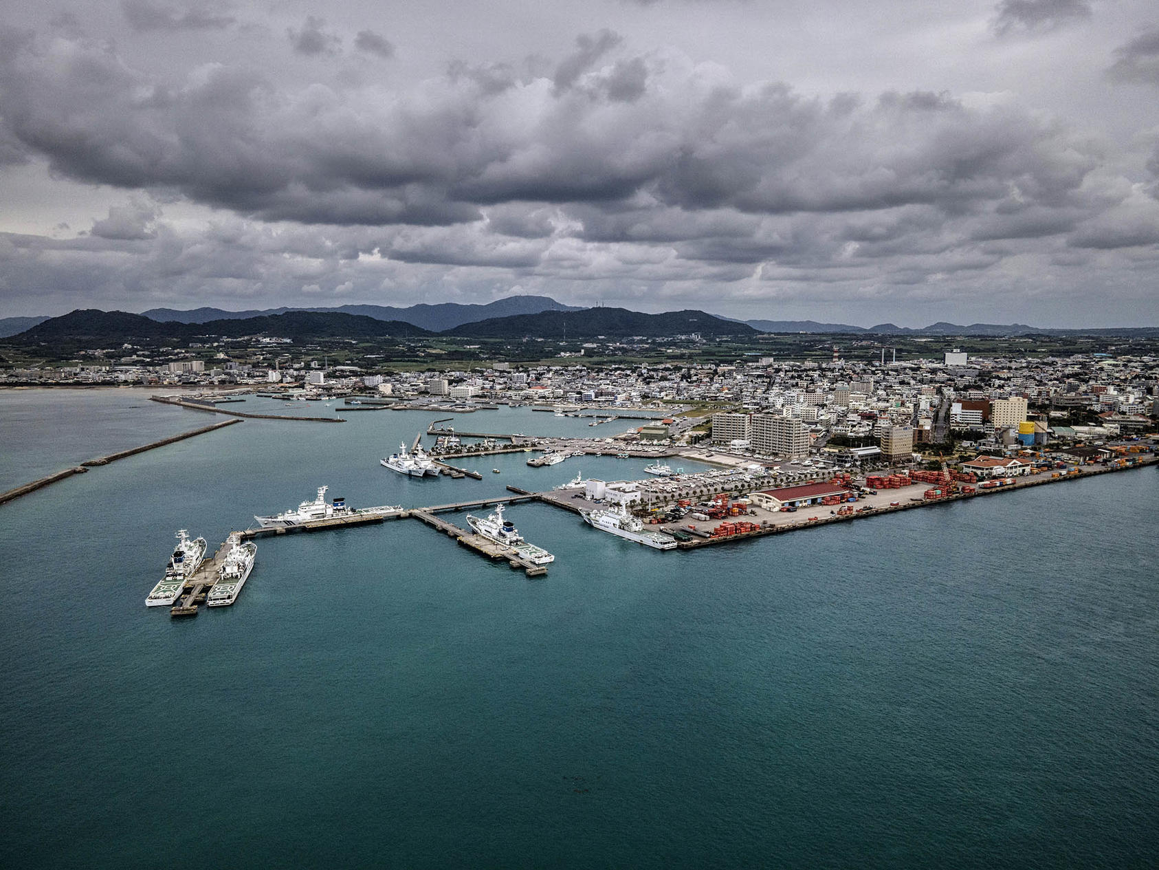 Japan Coast Guard patrol ships docked in the harbor on Ishigaki, Nov. 4, 2021. The island is home to Japan’s largest Coast Guard office, which devotes significant resources to patrolling the Senkaku Islands. (The New York Times)