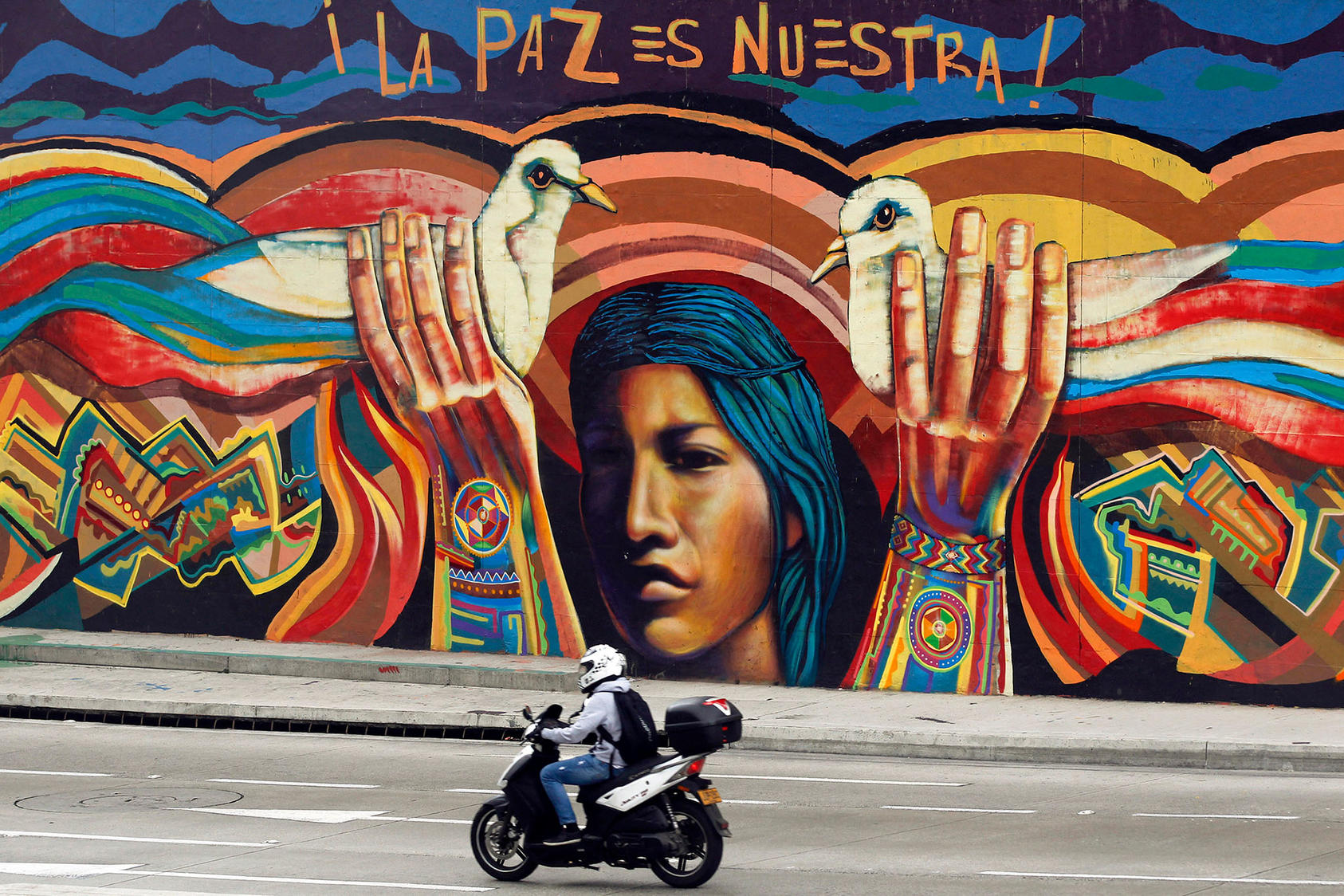 A mural that proclaims, “Peace is ours!” in Spanish is pictured in downtown Bogotá, Colombia, on September 17, 2013.