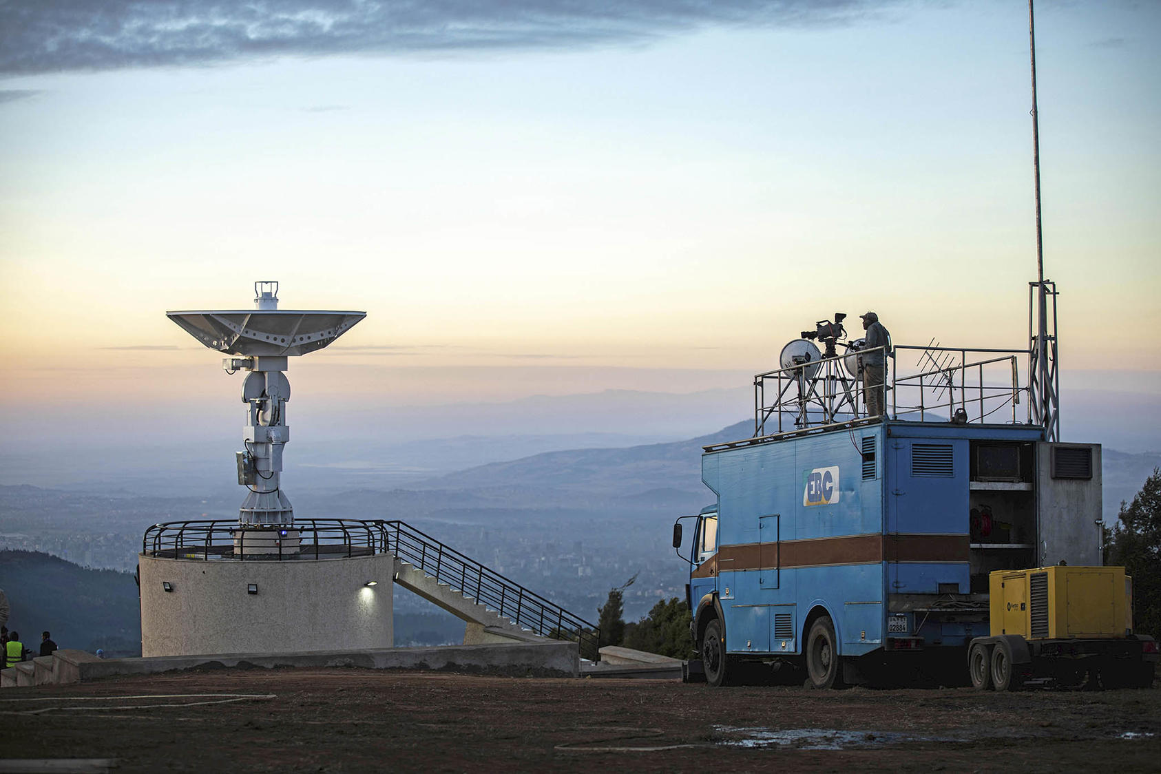 Ethiopia’s state-owned EBC broadcasts the launch of the nation’s first satellite, ETRSS-1, at the Entoto Observatory near Addis Ababa on December 20, 2019. (Photo by Mulugeta Ayene/AP)